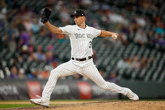 May 25, 2023; Denver, Colorado, USA; Colorado Rockies relief pitcher Brent Suter (39) pitches in the ninth inning against the Miami Marlins at Coors Field.